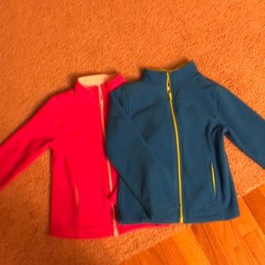 Cute Girls Blue and Pink zip up jackets.